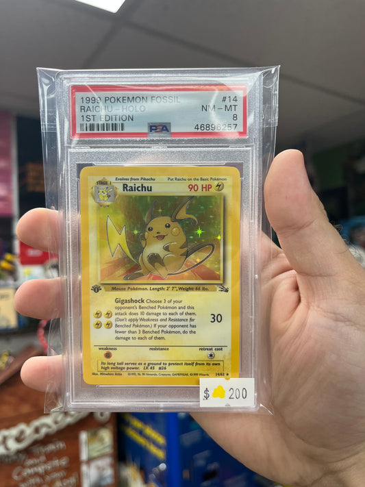 Pokemon TCG Fossil 1st Edition Raichu Holo PSA 8
