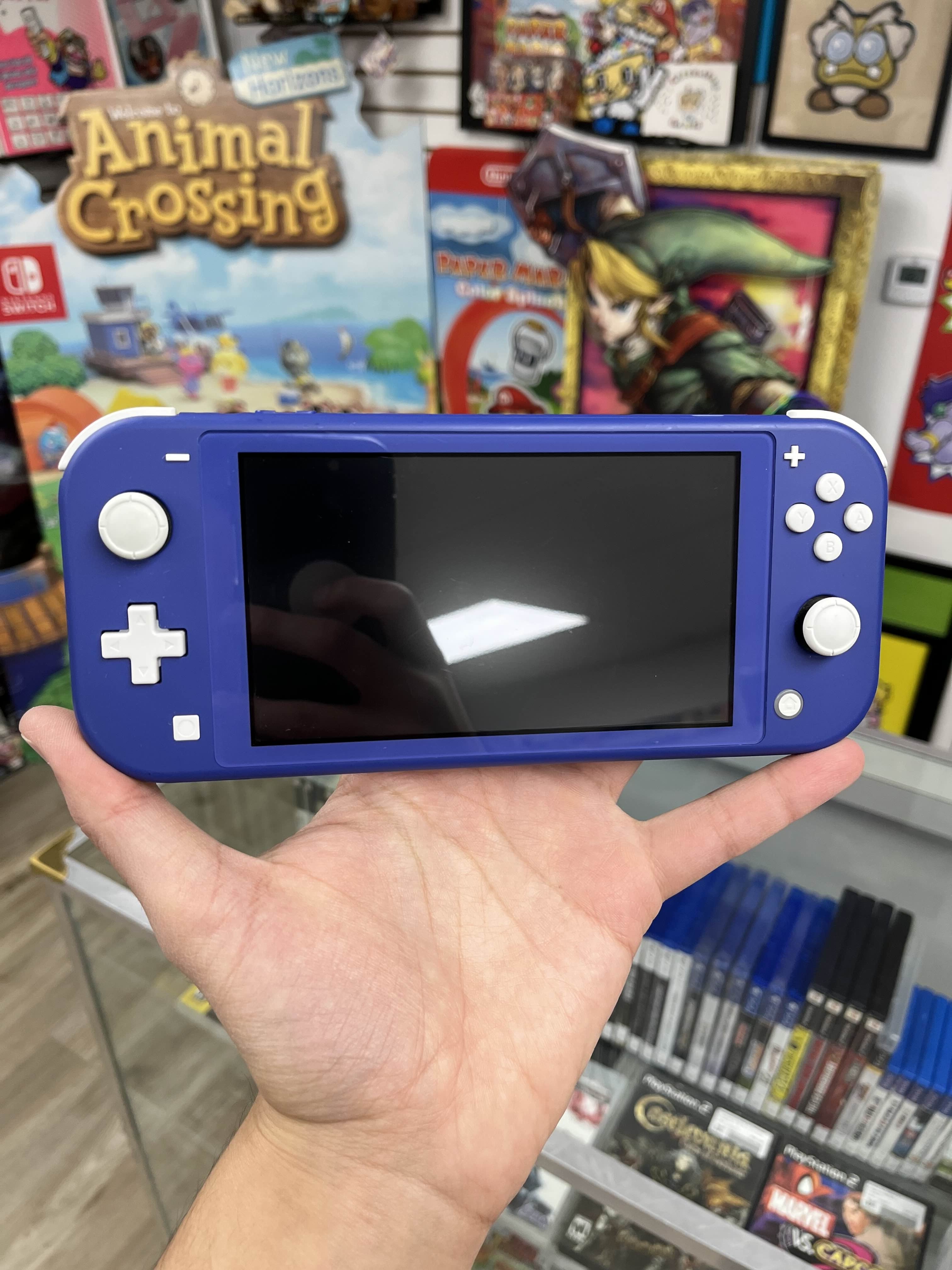 Blue Nintendo Switch Lite W/ Charger – CakeHoarder Games